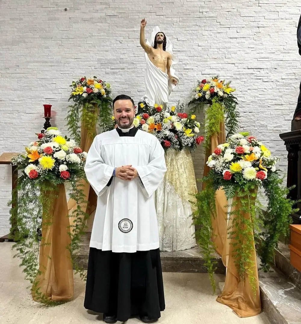 A priest in front of an altar
